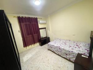 Ένα ή περισσότερα κρεβάτια σε δωμάτιο στο Yes inn