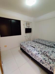 Katil atau katil-katil dalam bilik di Residencial Mercure