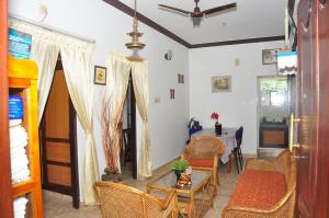 Posezení v ubytování Lazar Residency Homestay + 35 fotografií