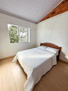 Ένα ή περισσότερα κρεβάτια σε δωμάτιο στο Casa Nalua +7 φωτογραφίες