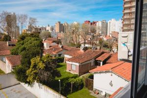 a view of a city from a window at Asturiano 6 Miramar in Miramar