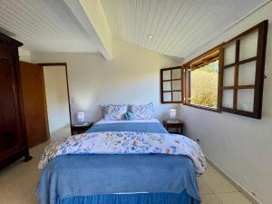 Postel nebo postele na pokoji v ubytování Refúgio de Luxo pra Viver Momentos Especiais