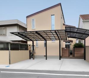 awning over a sidewalk in front of a building at Jomo Stay Takasaki 2 -the Garden- in Takasaki