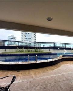 a large building with a pool in the middle at Rent in the Heart of COP 30 Belém in Belém