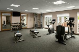 a gym with several treadmills and exercise machines at Residence Inn by Marriott Pullman in Pullman