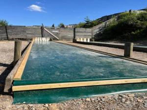 a pool of water on the side of a road at Camping tent with modern amenities in Trois-Ponts