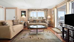 a living room with a couch and a coffee table at Thunder Island 75B in Ocean City
