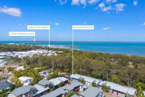 an aerial view of the beach and the ocean at Private Poolside Villa in Urangan