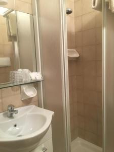 Koupelna v ubytování Hotel Margherita Meublè