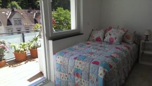 Postel nebo postele na pokoji v ubytování Loft Nagoldtal