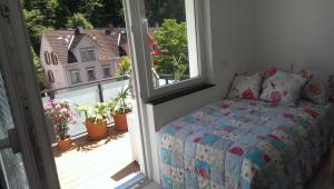 Postel nebo postele na pokoji v ubytování Loft Nagoldtal