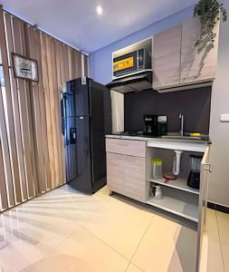 Kuchyň nebo kuchyňský kout v ubytování Luxury Apartaestudio Chapinero