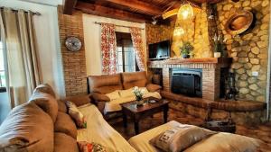 Posezení v ubytování Villa 58 by Villamya