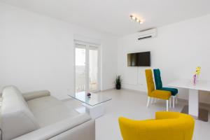 Телевизор и/или развлекательный центр в Apartment Royal