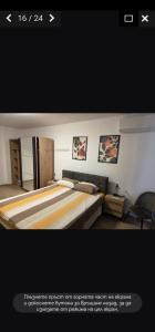 a poster of a bedroom with a large bed at PremiumApartment in Burgas City +5 photos