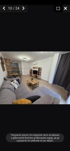 a picture of a living room with a couch at PremiumApartment in Burgas City