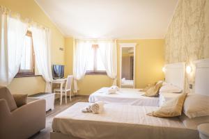 Postel nebo postele na pokoji v ubytování La Dimora di Francesco