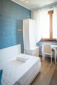Postel nebo postele na pokoji v ubytování La Dimora di Francesco