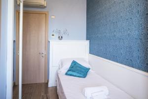 Postel nebo postele na pokoji v ubytování La Dimora di Francesco