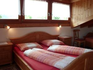 Postel nebo postele na pokoji v ubytování Rosenheim