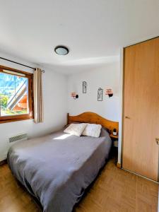Postel nebo postele na pokoji v ubytování Appartement ski aux pieds & piscine - Flumet + 13 fotografií
