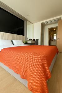 Ένα ή περισσότερα κρεβάτια σε δωμάτιο στο The Ozone Condominium +9 φωτογραφίες