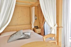 Postel nebo postele na pokoji v ubytování Hotel La Tea + 37 fotografií