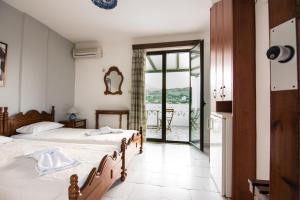 Voodi või voodid majutusasutuse Hotel Melikari toas
