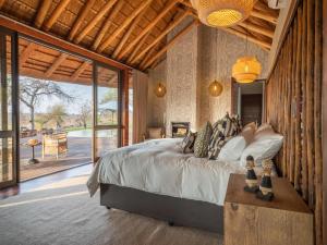 Ένα ή περισσότερα κρεβάτια σε δωμάτιο στο Tintswalo Scops Rest