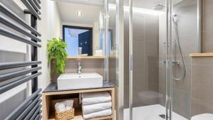 Ένα μπάνιο στο ASAI210-4-2 Appartement 4 étoiles Les Saisies - 8 personnes