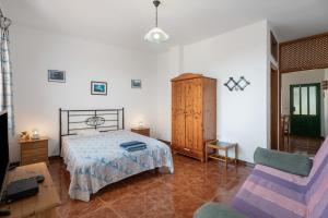 Katil atau katil-katil dalam bilik di Apartamento Nayara C