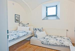 Postel nebo postele na pokoji v ubytování Denkmal-Wohnung in Bamberg