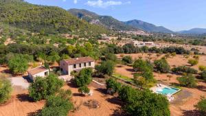 an aerial view of a house with a pool at Empaltada in Selva