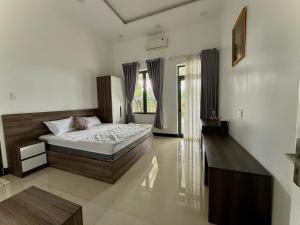 Postel nebo postele na pokoji v ubytování Bao Ong Thien Retreat - Khu Nghỉ Dưỡng Bào Ông Thiền