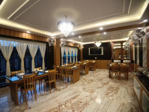 Restaurace v ubytování Coral Beach Resort Mandarmoni