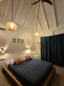 Una cama o camas en una habitación de Bois Coco
