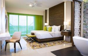 Katil atau katil-katil dalam bilik di 3 Bedroom Oceanfront Residence in Garza Blanca Resort & Spa Cancun