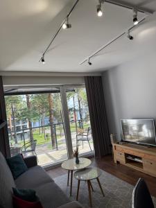 TV/trung tâm giải trí tại Sosnowe Apartamenty - Marina