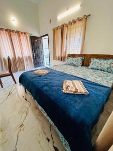 Postel nebo postele na pokoji v ubytování Rock Finch Holiday Homes - Malpe Beach + 62 fotografií