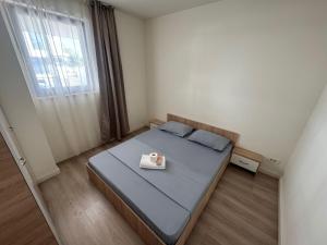 Postel nebo postele na pokoji v ubytování Apartamentul Familiei 3 langa Aeroport Otopeni + 7 fotografií