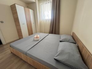 Postel nebo postele na pokoji v ubytování Apartamentul Familiei 3 langa Aeroport Otopeni