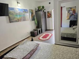 Ένα ή περισσότερα κρεβάτια σε δωμάτιο στο Casa Rico 2