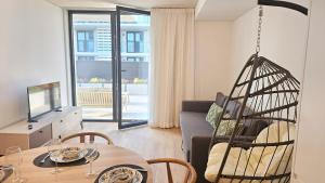 Et tv og/eller underholdning på A Proa do Moliceiro DOCA Terrace Barra Beach