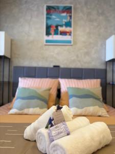 En eller flere senge i et værelse på Appartement Vue mer avec Piscine