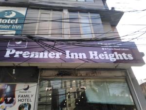 a purple sign on the front of a store at Premier Inn Heights hotel Davis Road Lahore in Lahore