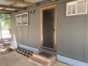 a front door of a house with a window at Cycle on Star Lane in Wooragee +16 photos