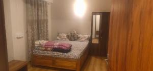 Giường trong phòng chung tại Yang's Stay +4 ảnh