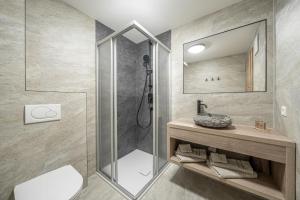 Koupelna v ubytování Auer-Fiegl + 55 fotografií