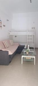 Ένα ή περισσότερα κρεβάτια σε δωμάτιο στο Carolina Apartments Crete