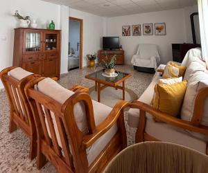 TV a/nebo společenská místnost v ubytování Casa Riondas